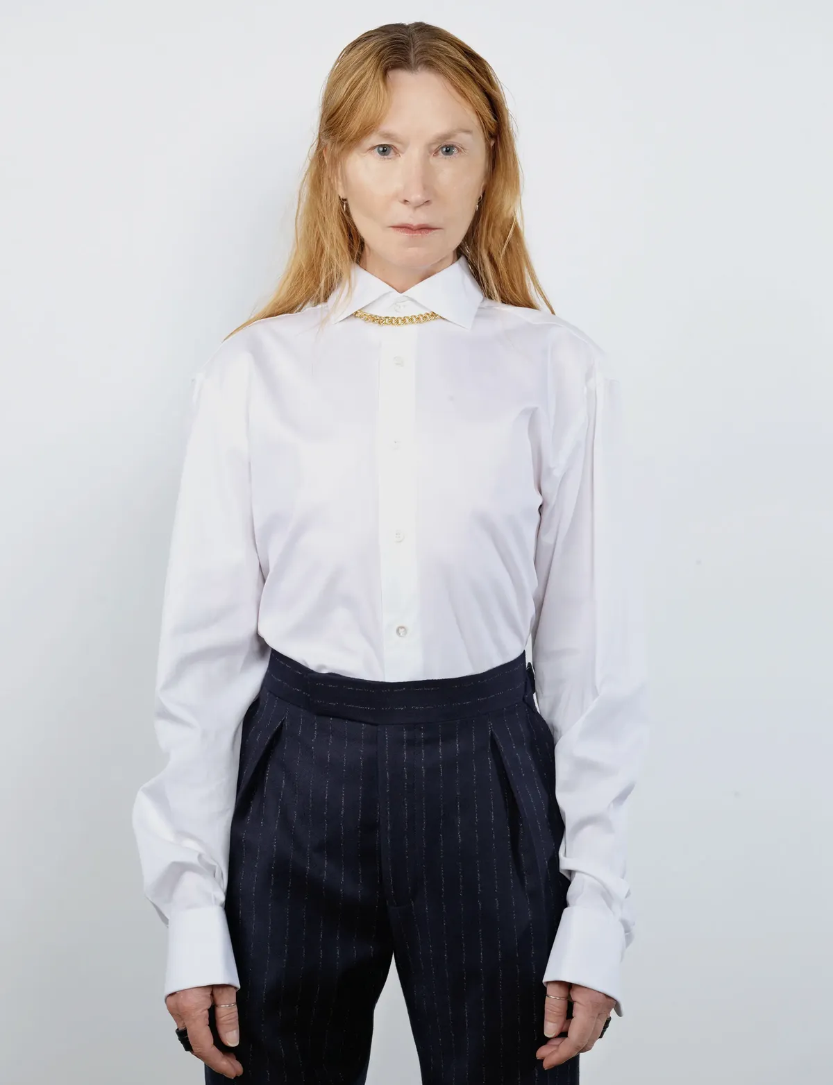 <p>GIEVES &amp; HAWKES shirt and trousers, Tom Wood chain necklace. </p>