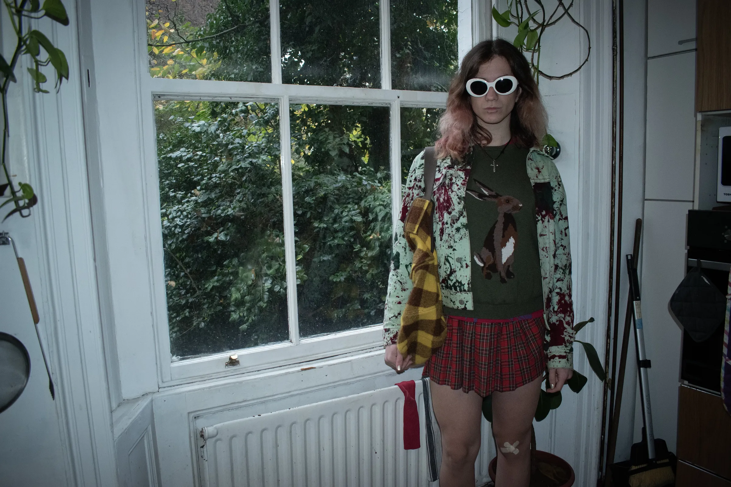 <p><span style="color:hsl(0,0%,100%);">S.R. STUDIO jacket, VINTAGE bunny knit, ERL skirt, RICK OWENS bag, ACNE STUDIOS sunglasses</span></p>