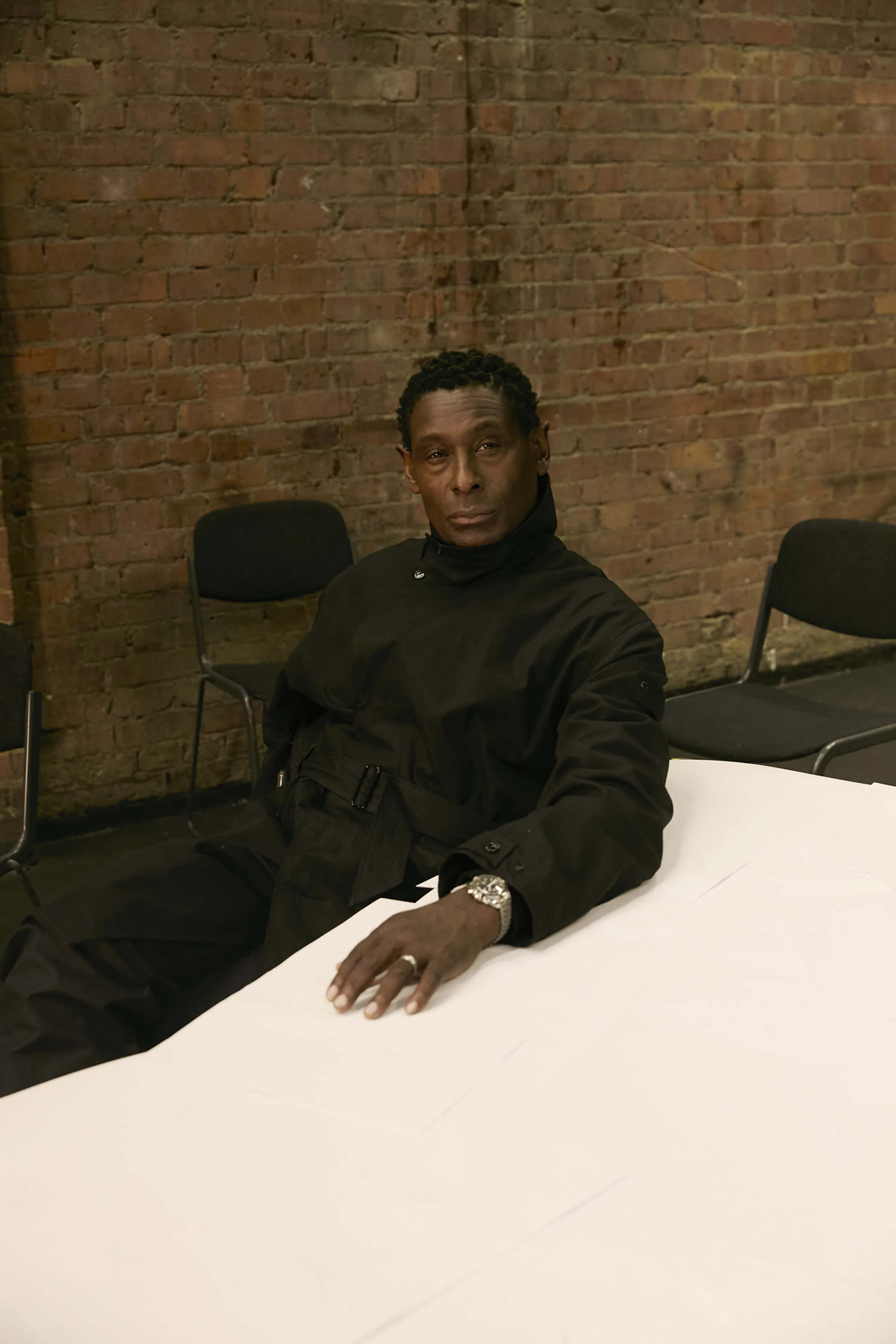 <p><span style="color:hsl(0,0%,100%);">LEE JEANS jumper, STONE ISLAND coat and trousers, OMEGA watch.</span></p>