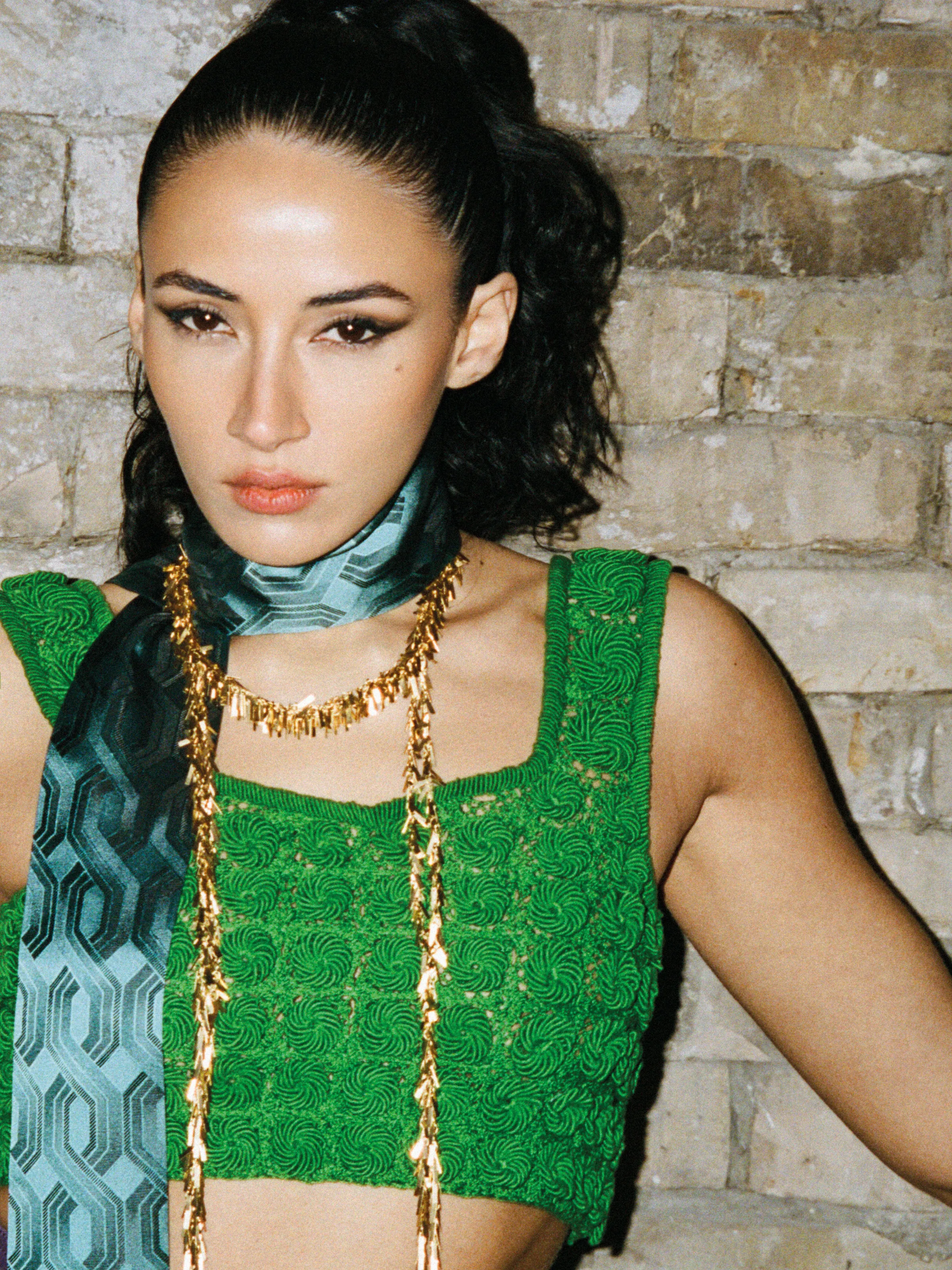 <p>BURBERRY scarf and top, BIMBA Y LOLA necklace.</p>