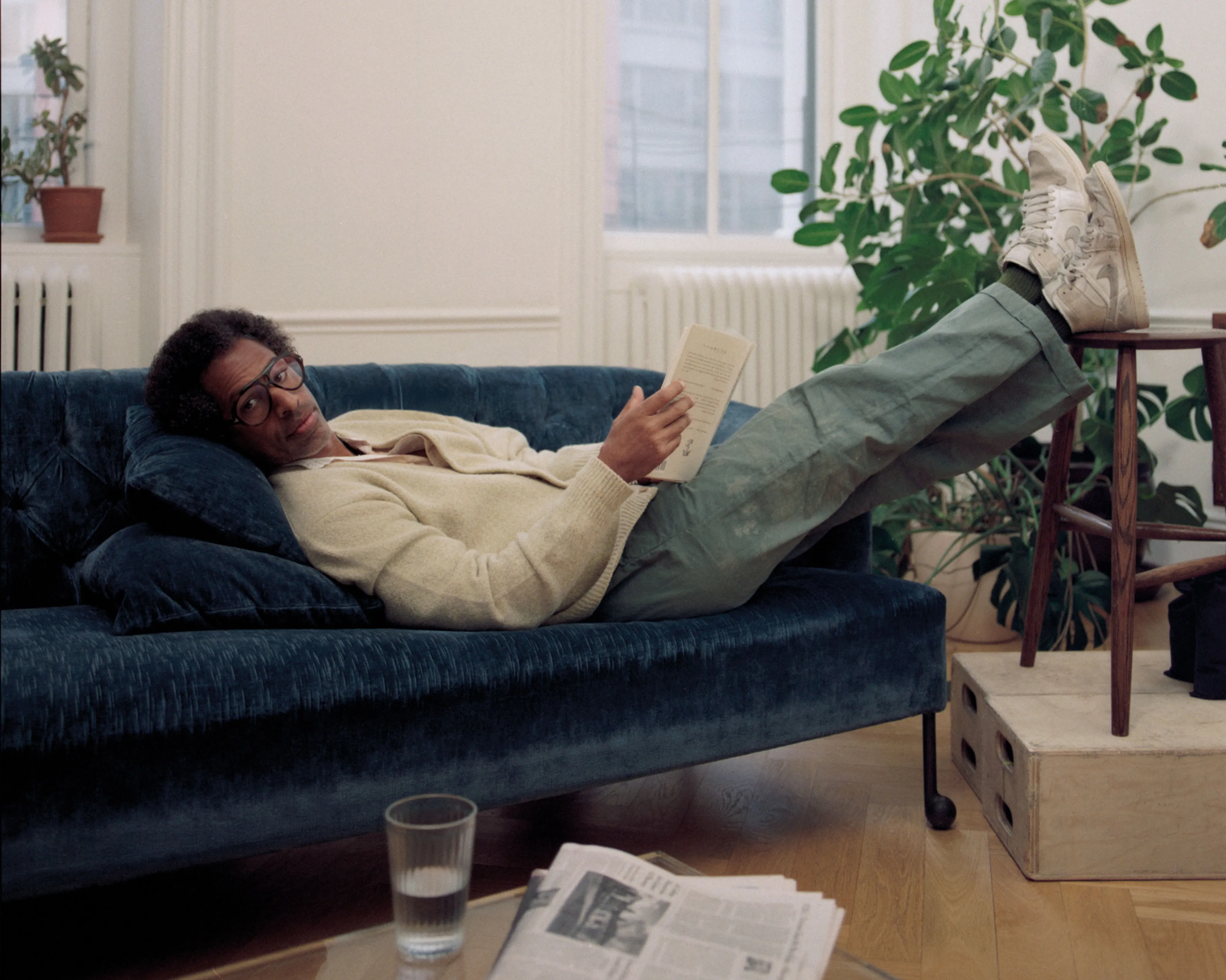 <p>MOTHFOOD Sweater, pants and TOURÉ own shoes and glasses.</p>