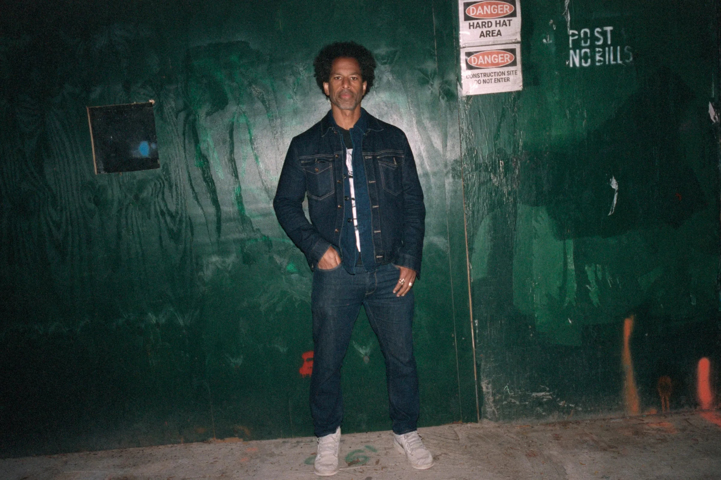 <p><span style="color:hsl(0,0%,100%);">TOURÉ own denim jacket, shirt, jeans and jewellery.</span></p>