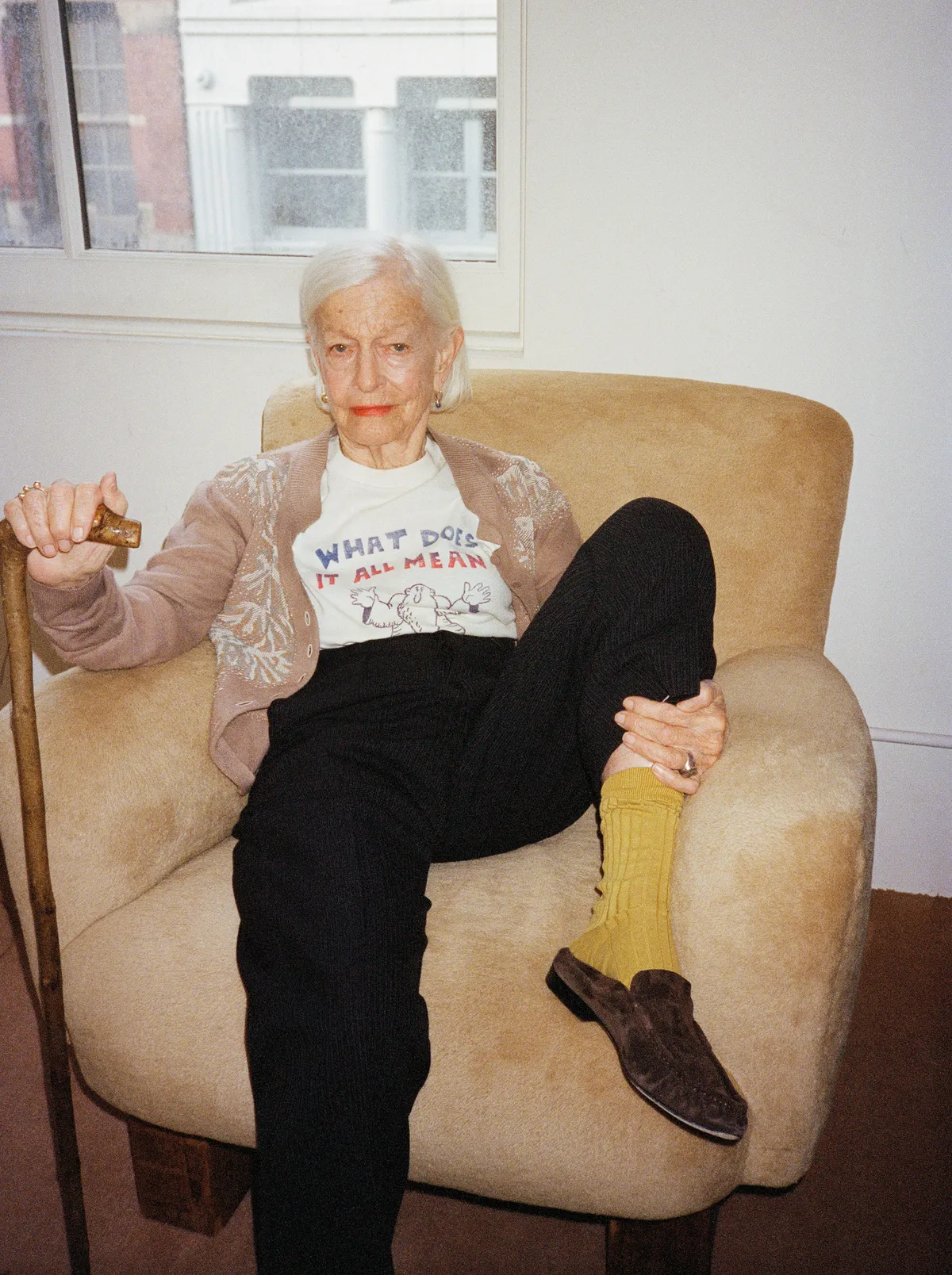 <p><span style="color:hsl(0,0%,100%);">TORY BURCH cardigan, MOTHFOOD VINTAGE vintage tee &amp; trousers, stylist's own socks, THE ROW shoes, Joan's ring &amp; earrings.</span></p>